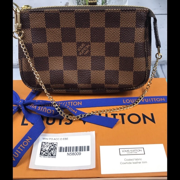 Louis Vuitton Handbags - NWT Louis Vuitton Ebene Mini Pochette w Box Bag
